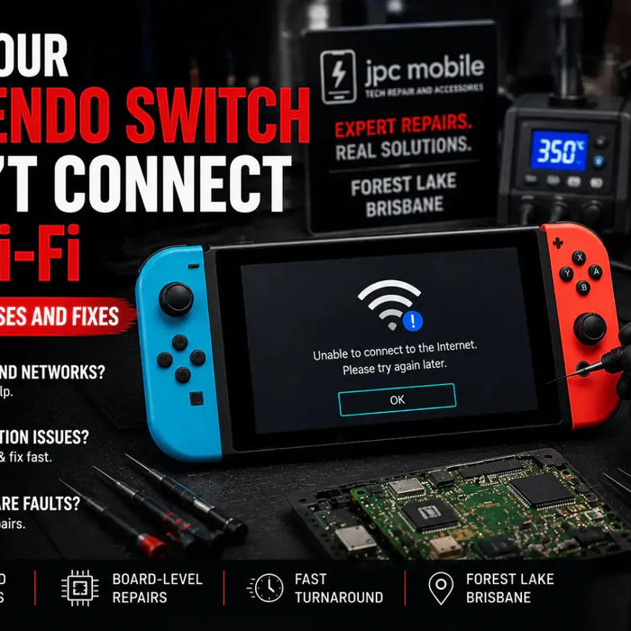 Technician diagnosing a Nintendo Switch with Wi-Fi connection problems