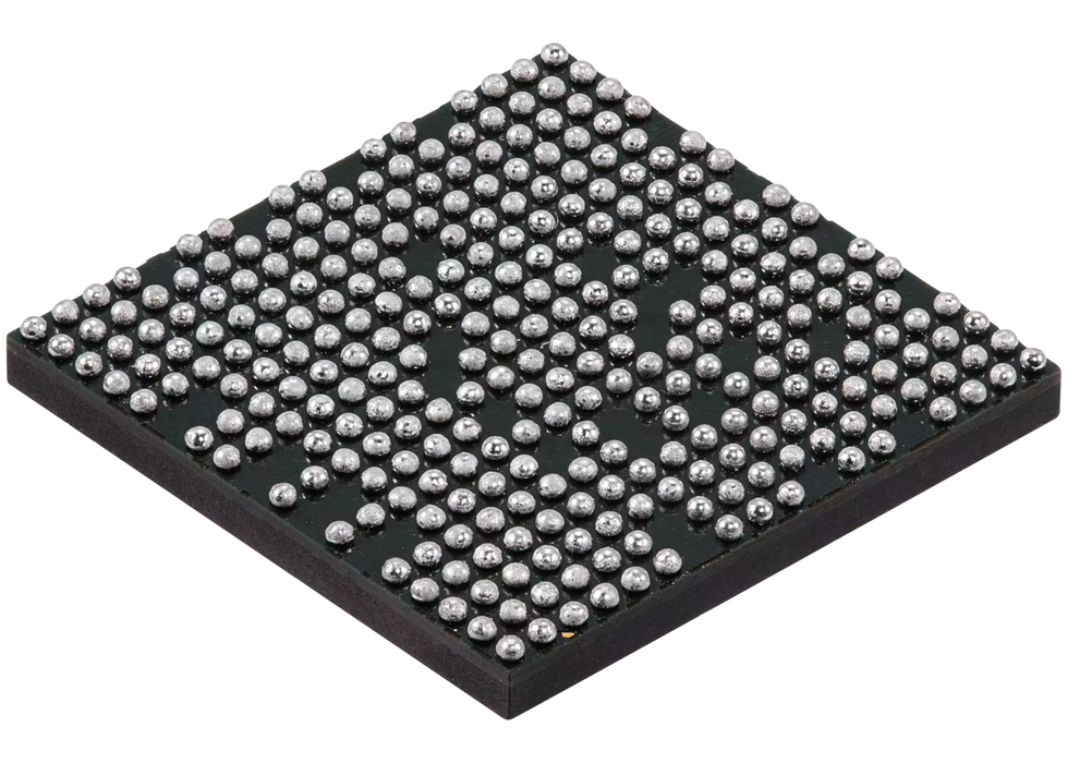 Angled view of the BGA solder-ball underside on the CXD90069GG IC