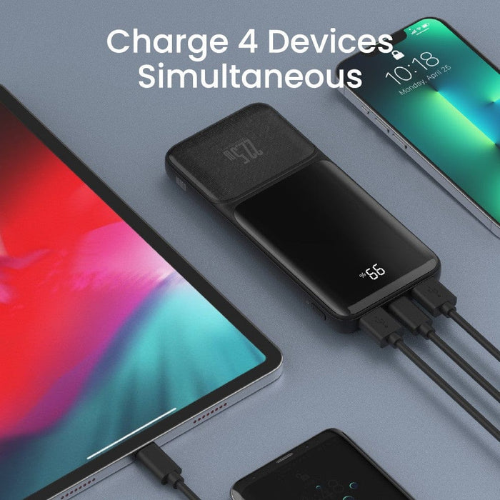 Pocket-sized iQuick power bank next to keys for scale	