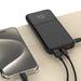 Weight test of iQuick power bank on digital scale	