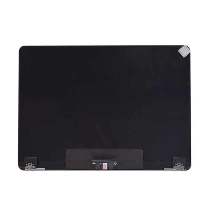 Close-up of top lid edge on silver MacBook A3113 display	