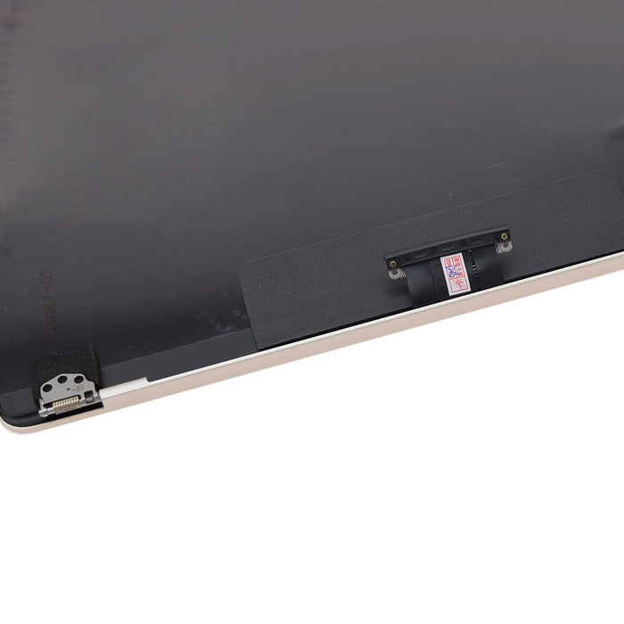 Close-up of edge finish on MacBook Air A3113 white display panel	