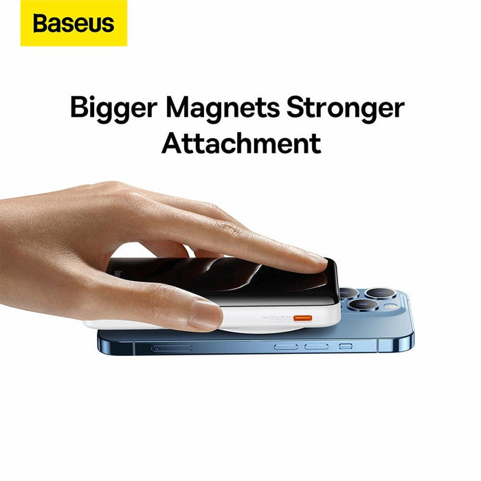 Close-up of Baseus power bank LED display with real-time charging status.