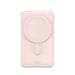 Baseus power bank charging two devices simultaneously with fast charge capability.
