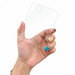 Close-up of a clear tempered glass screen protector held in hand
